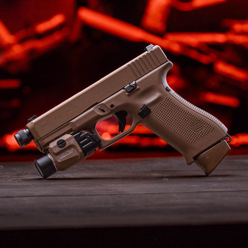 Streamlight TLR-7 HL-X USB 1100 lumen weapon light in flat dark earth (part 69459), mounted on a Glock pistol